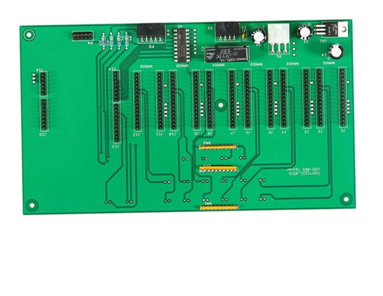 A control board with a row of pin headers, a DIP IC, a relay and gold-plated contact strips