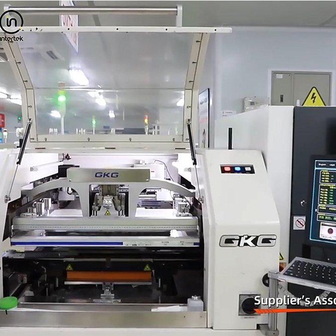 Inside a GKG solder paste printer, showing the stencil and squeegee assembly