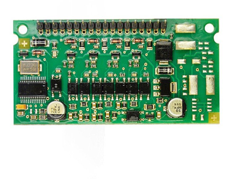 A board with a row of gold-plated through-hole posts along one edge, a large IC and metal-film resistors