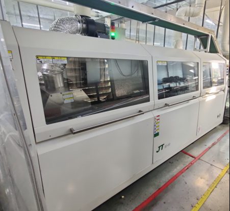 JT reflow oven on the SMT line at Hongrong's factory